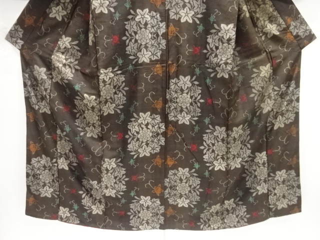  アンティーク　橘唐草に花模様織り出し本場泥大島紬着物(割り込み絣)